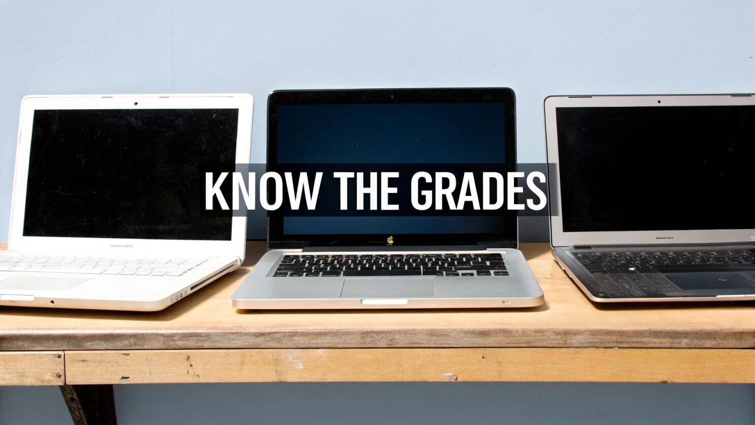 A close-up of a laptop keyboard with a person's hands typing