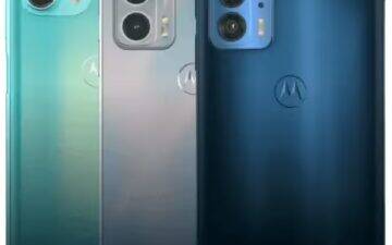 Three Motorola mobile phones displayed together.